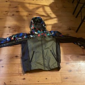 I am selling a khaki colored superdry rain jacket that is an XL